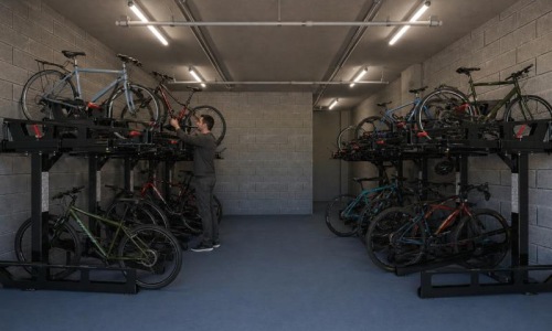 a person working on a bike rack